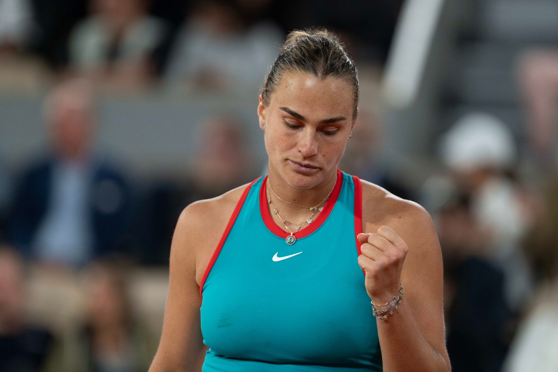 Aryna Sabalenka reacts to a point during her match against Iga Swiatek of Poland on day 12 at Roland Garros Stadium.