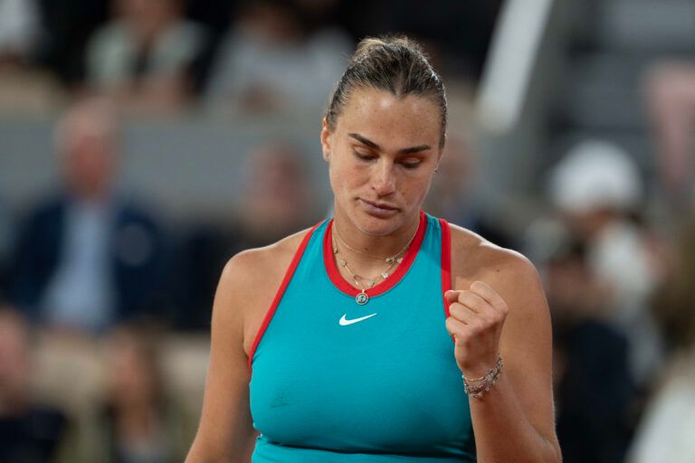 Aryna Sabalenka reacts to a point during her match against Iga Swiatek of Poland on day 12 at Roland Garros Stadium.