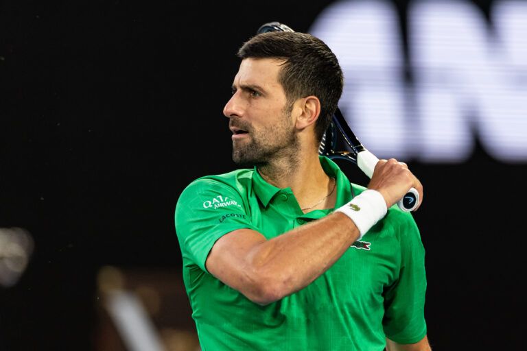 Novak Djokovic of Serbia in action against Carlos Alcaraz of Spain in the final of the mens singles at the Australian Open at Rod Laver Arena in Melbourne Park.