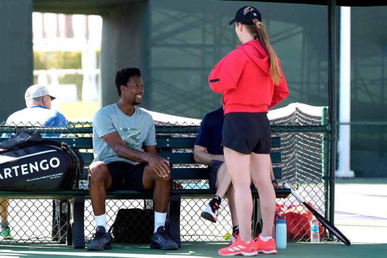 Gael Monfils of France shares a smile with his wife and fellow professional tennis player, Elina Svitolina of Ukraine, during a practice session at the BNP Paribas Open in Indian Wells, Calif., on Sunday, March 2, 2025.