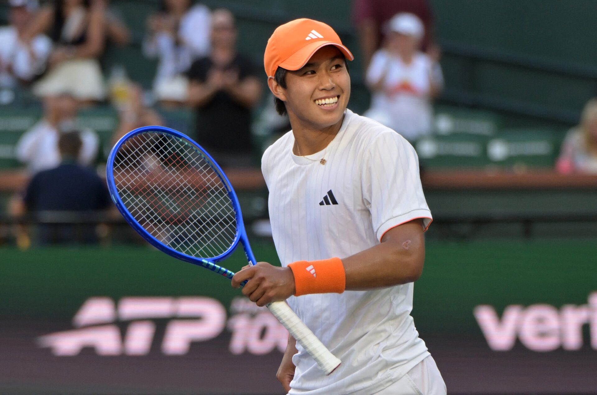 Learner Tien (USA) smiles after defeating Alejandro Davidovich Fokina (ESP) during his fourth round match in the BNP Paribas Open at the Indian Wells Tennis Garden.