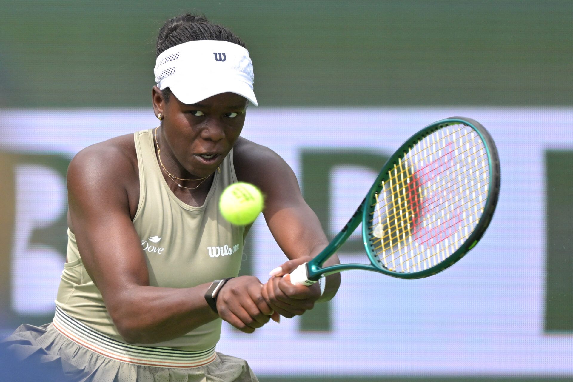 Victoria Mboko (CAN) hits a shot during her second round match against Kimberly Birrell (AUS) in the BNP Paribas Open at the Indian Wells Tennis Garden.