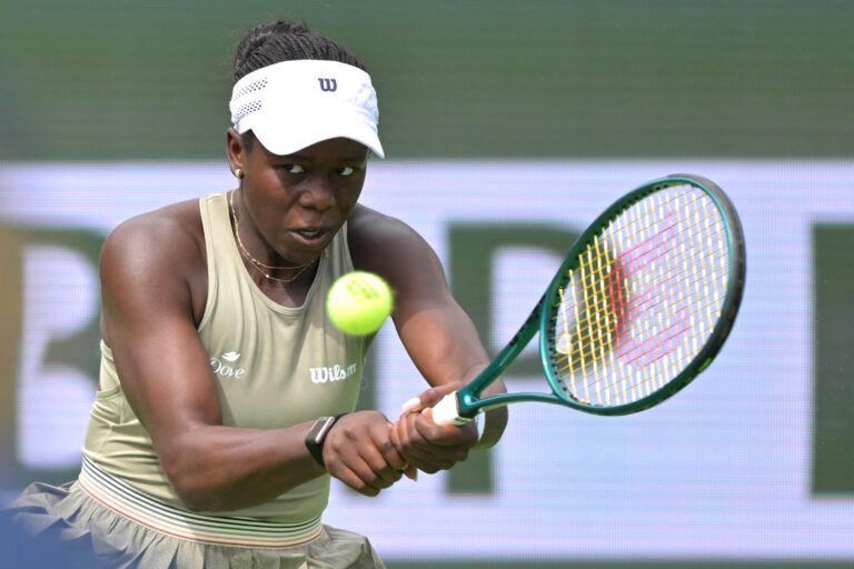 Victoria Mboko (CAN) hits a shot during her second round match against Kimberly Birrell (AUS) in the BNP Paribas Open at the Indian Wells Tennis Garden.