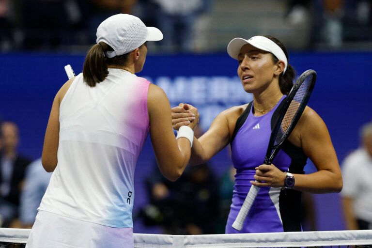 Jessica Pegula (USA)(R) shakes hands with Iga Swiatek (POL)(L) after their match on day ten of the 2024 U.S. Open tennis tournament at USTA Billie Jean King National Tennis Center.