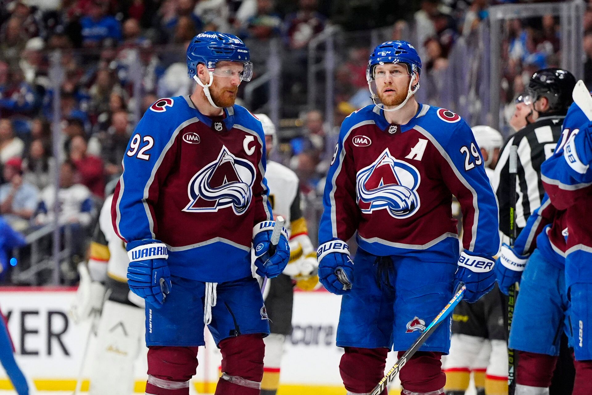 Colorado Avalanche left wing Gabriel Landeskog (92) and center Nathan MacKinnon (29) react following a Vegas Golden Knights goal during the third period of game two of the Western Conference Final of the 2026 Stanley Cup Playoffs at Ball Arena.