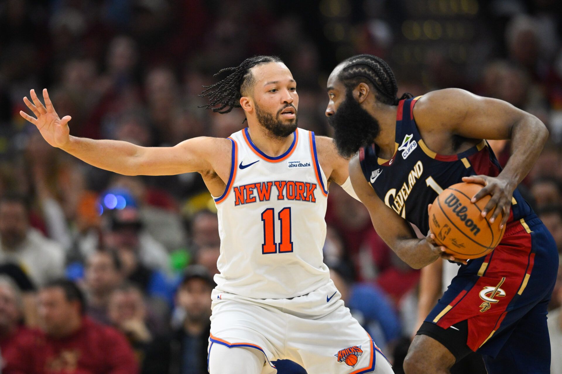 New York Knicks guard Jalen Brunson (11) defends Cleveland Cavaliers guard James Harden (1) in the third quarter during game three of the eastern conference finals for the 2026 NBA playoffs at Rocket Arena.