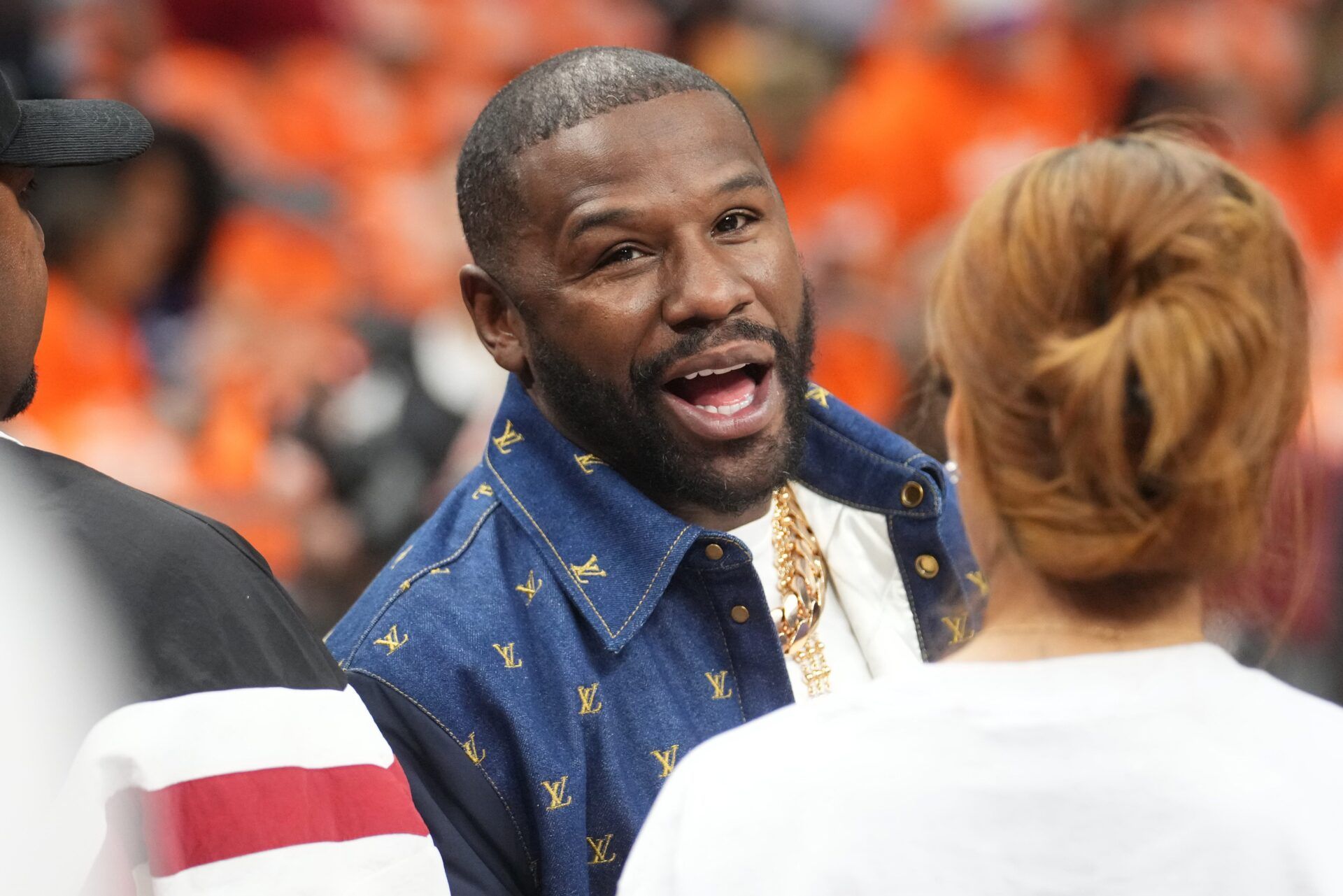 Floyd Mayweather Jr. sits courtside as the Phoenix Mercury play the Las Vegas Aces during Game 3 of the WNBA Finals at Mortgage Matchup Center in Phoenix on Oct. 8, 2025.