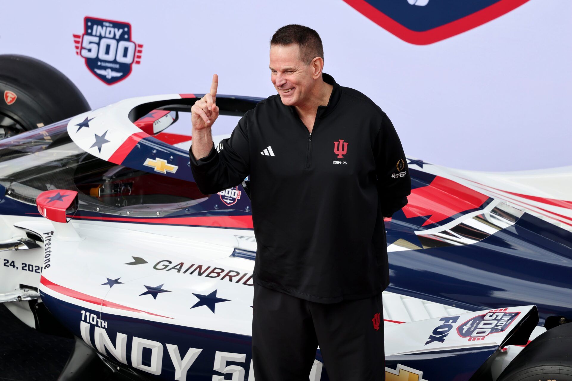 Indiana University football head coach Curt Cignetti walks the red carpet Sunday, May 24, 2026, ahead of the 110th running of the Indianapolis 500 at Indianapolis Motor Speedway.