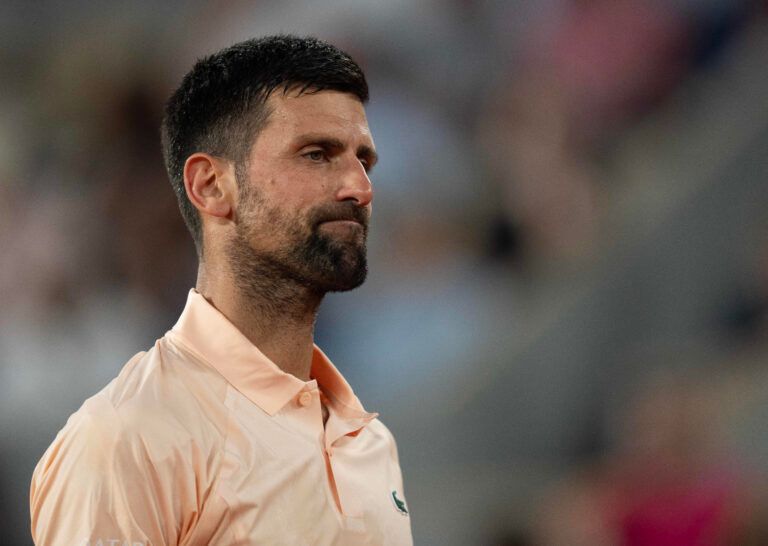 Novak Djokovic of Serbia reacts during his first round match against Giovanni Mpetshi Perricard of France on day one at Stade Roland Garros.