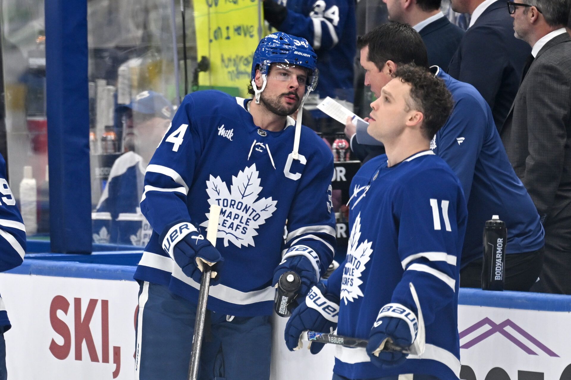 Toronto Maple Leafs forward Auston Matthews (34) speaks with forward Max Domi at Scotiabank Arena.