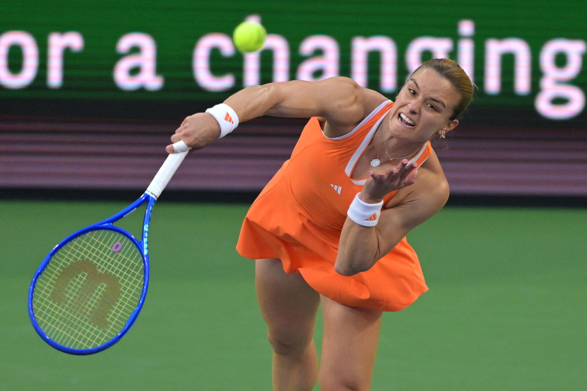 Maria Sakkari (GRE) serves against Iga Swiatek (POL) during her third round match against in the BNP Paribas Open at the Indian Wells Tennis Garden.