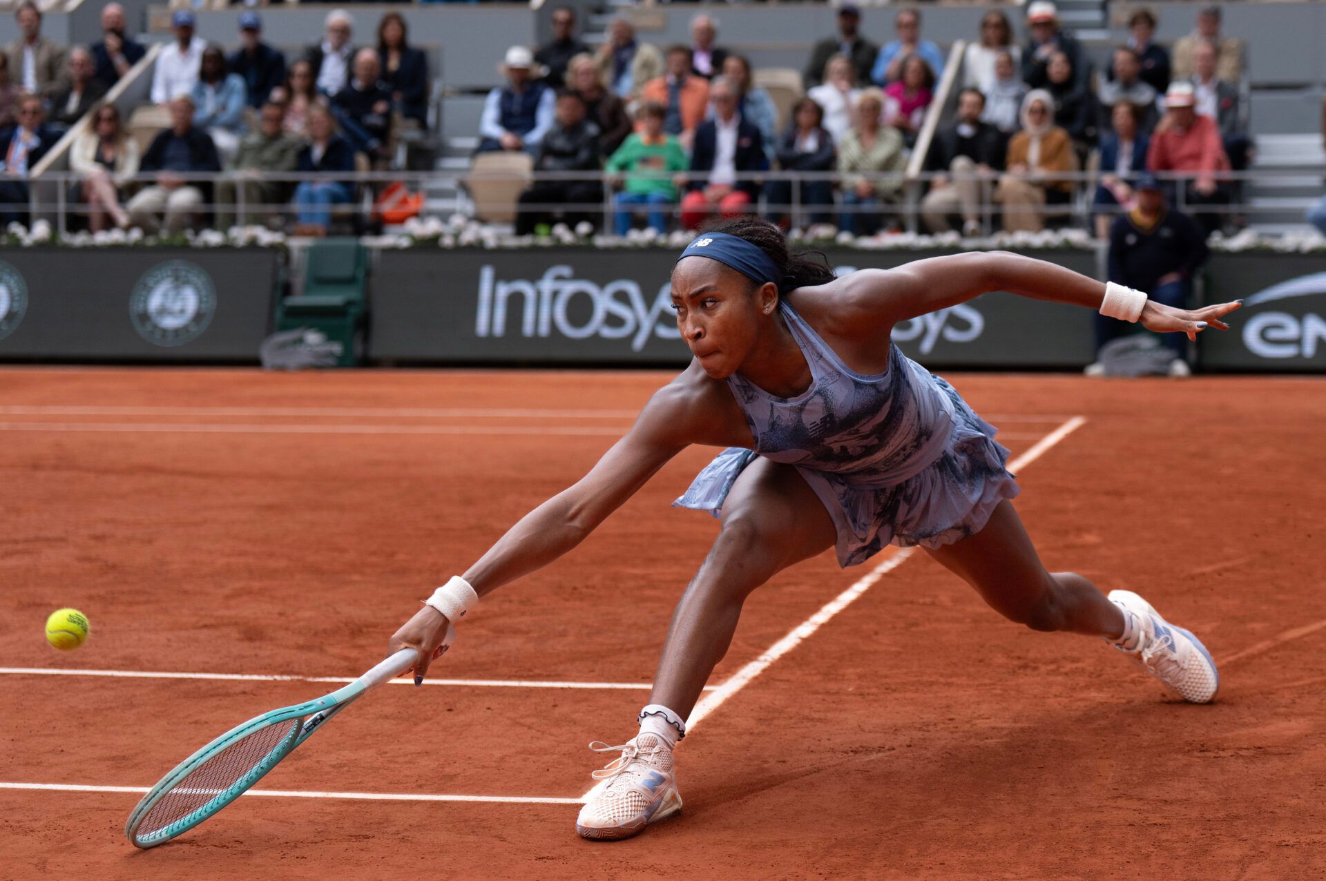 Coco Gauff of the United States returns a shot during the womenÕs singles final against Aryna Sabalenka on day 14 at Roland Garros Stadium.
