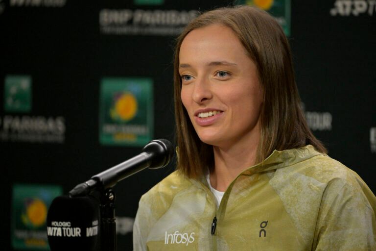 Iga Swiatek (POL) talks to the media during a news conference during the BNP Paribas Open at the Indian Well Tennis Garden.