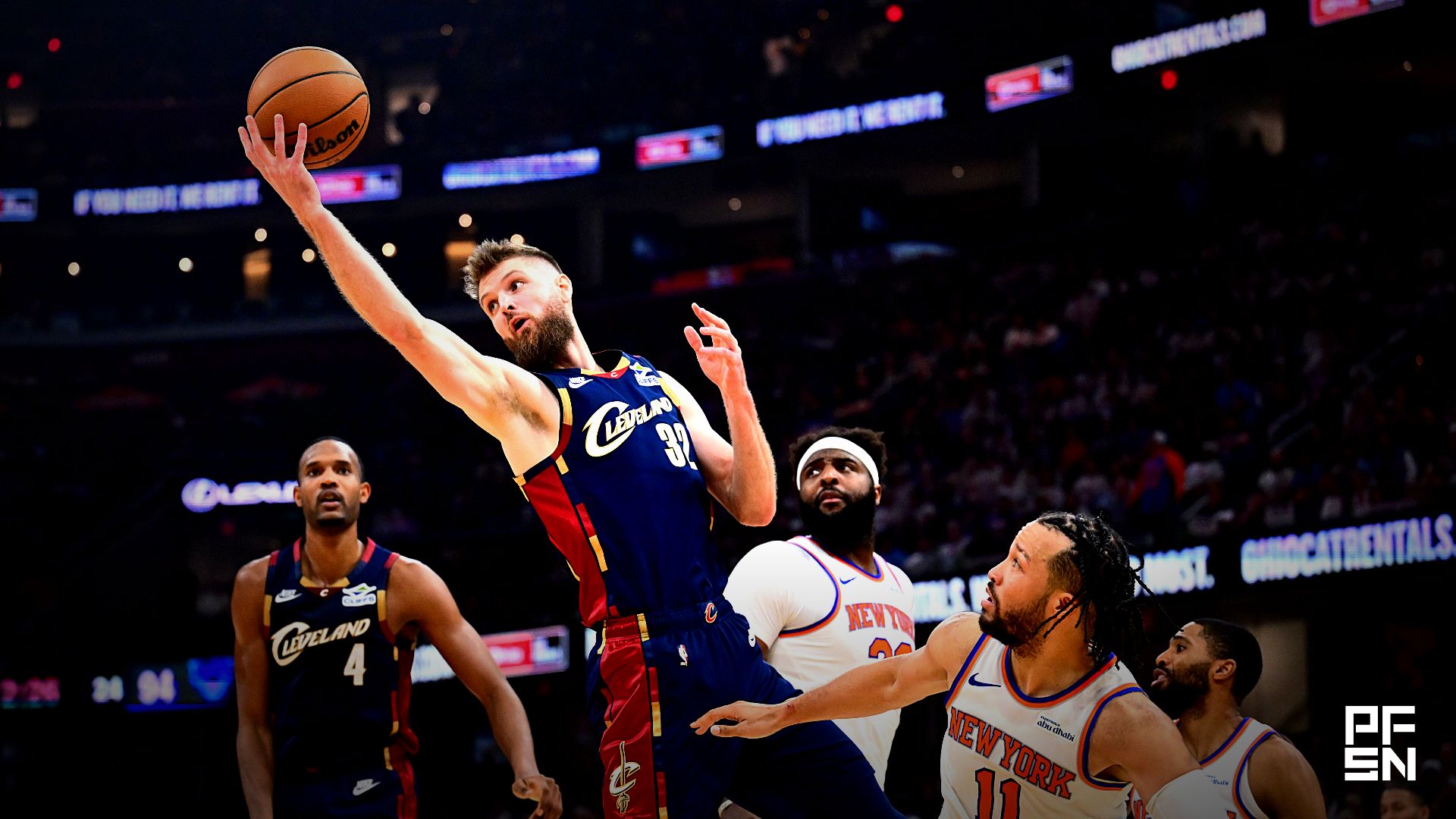 Cleveland Cavaliers forward Dean Wade (32) rebounds the ball in the fourth quarter against the New York Knicks during game four of the eastern conference finals for the 2026 NBA playoffs at Rocket Arena.