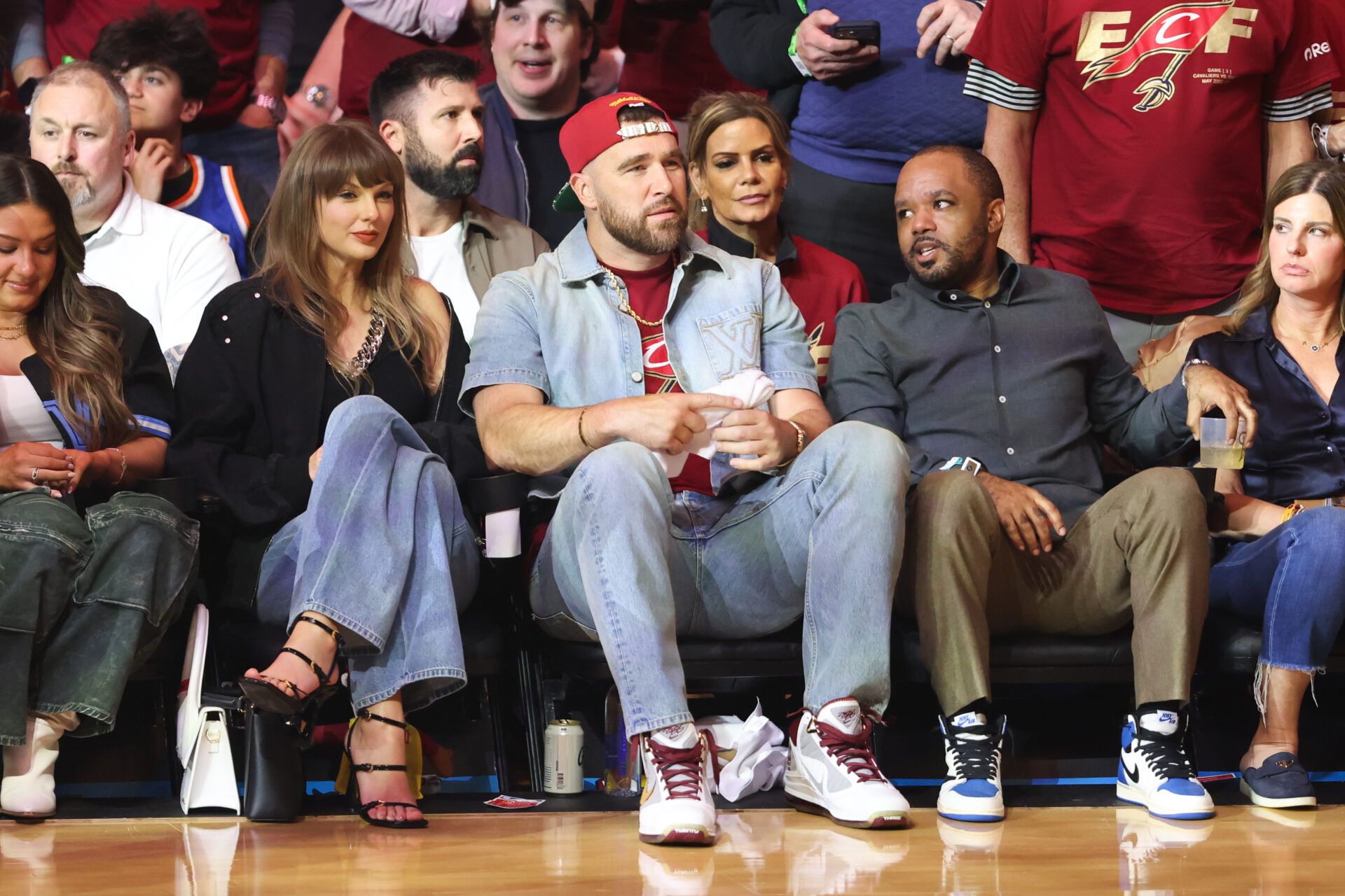 Taylor Swift and Travis Kelce look on during game three of the eastern conference finals for the 2026 NBA playoffs between the New York Knicks and Cleveland Cavaliers at Rocket Arena.