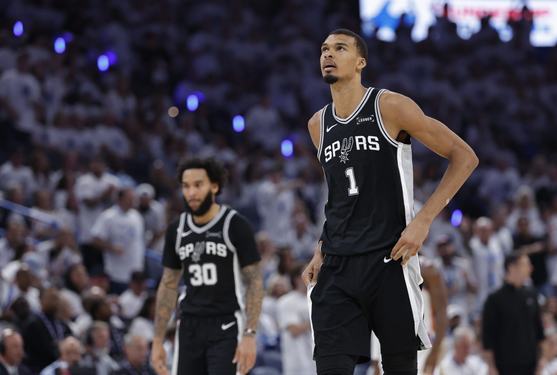 San Antonio Spurs forward Victor Wembanyama (1) reacts after a play during the third quarter against the Oklahoma City Thunder in game five of the western conference finals for the 2026 NBA playoffs at Paycom Center.