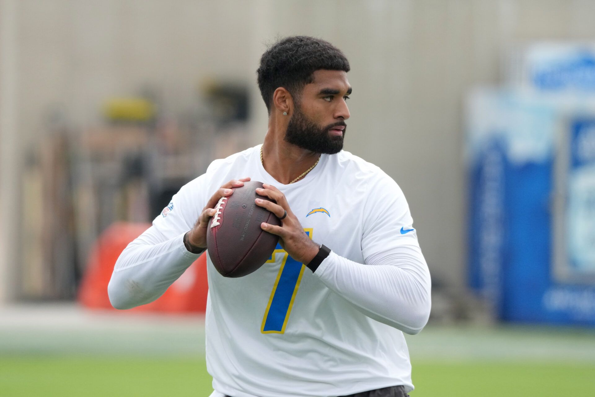 Los Angeles Chargers quarterback DJ Uiagalelei (7) throws the ball during offseason workouts at The Bolt.