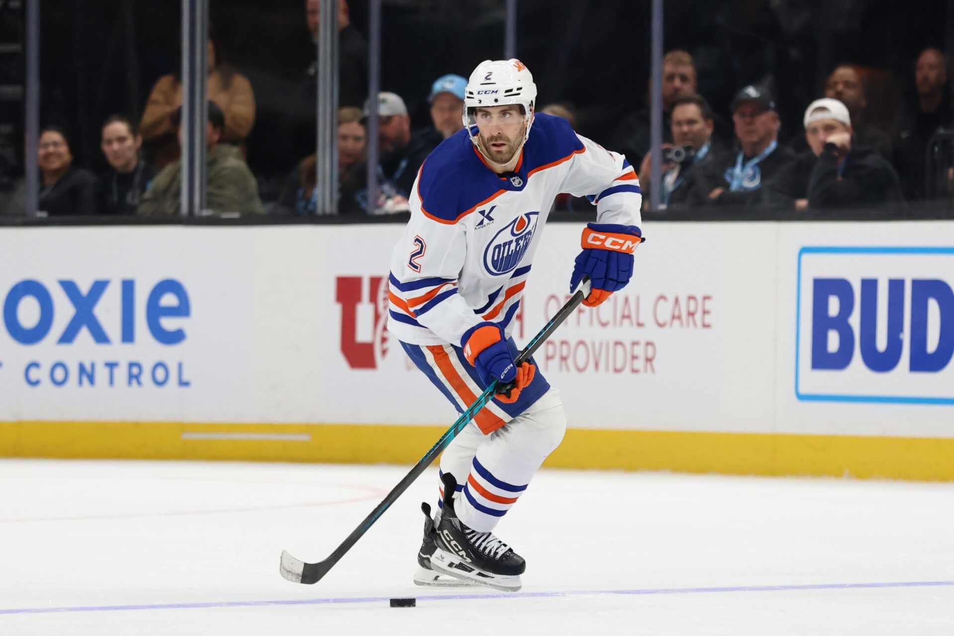 Edmonton Oilers defenseman Evan Bouchard (2) skates with the puck against the Utah Mammoth during overtime at Delta Center.