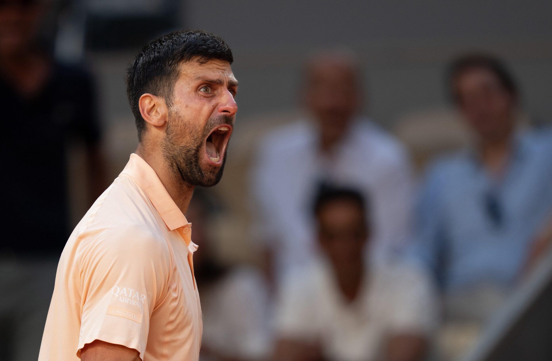 Novak Djokovic of Serbia reacts during his match against Valentin Royer of France on day four at Stade Roland Garros.