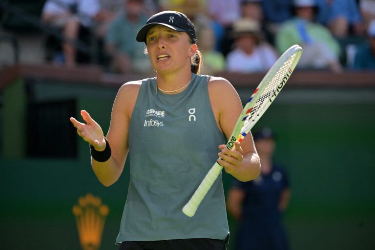 Iga Swiatek (POL) shows some frustration in her quarterfinal against Elina Svitolina (UKR) during the BNP Paribas Open at the Indian Wells Tennis Garden.