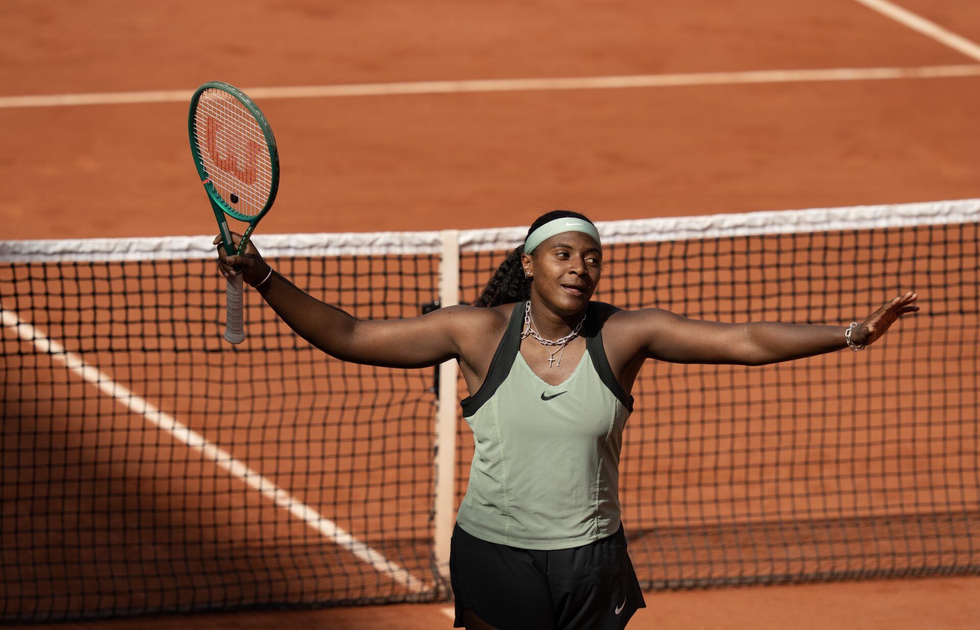 Hailey Baptiste of the United States celebrates winning her first round match against Barbora Krejcikova of the Czech Republic on day one at Stade Roland Garros.