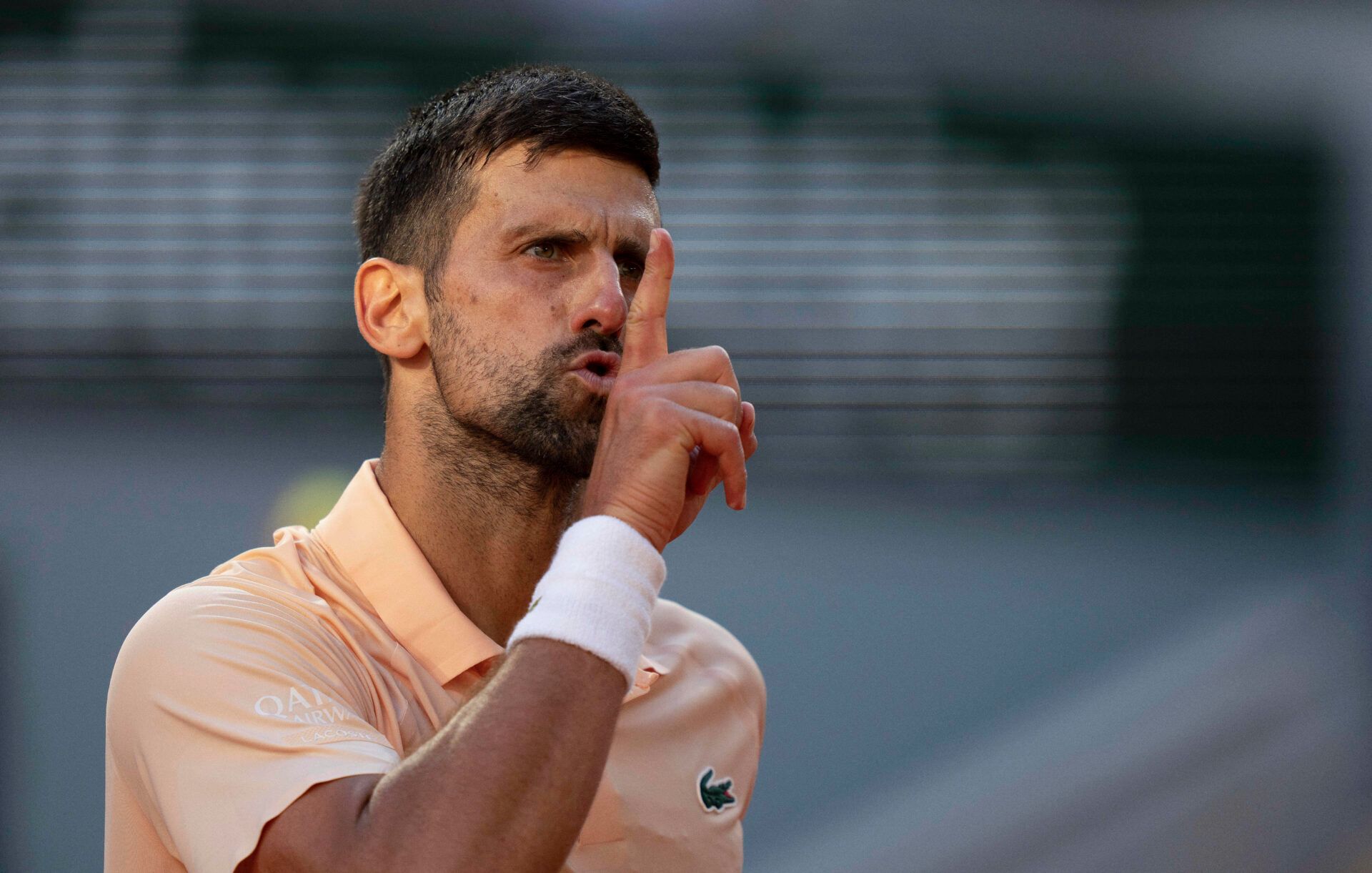 Novak Djokovic of Serbia reacts during his match against Valentin Royer of France on day four at Stade Roland Garros.