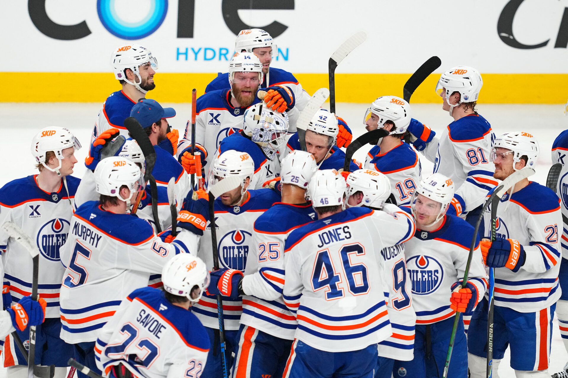 Edmonton Oilers players celebrate at T-Mobile Arena.