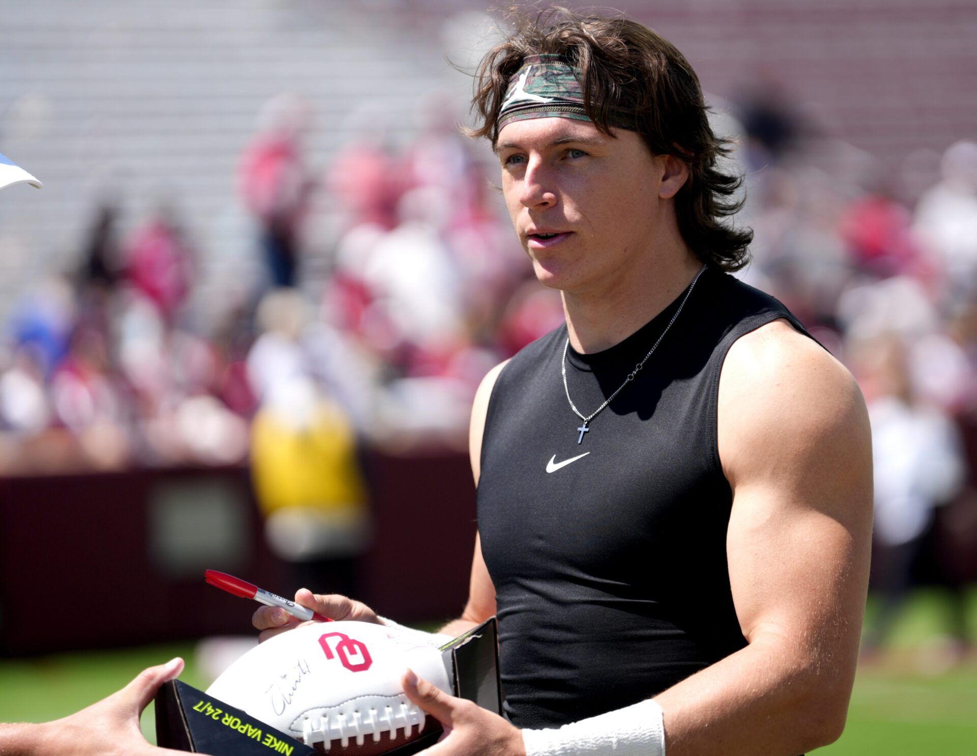 Oklahoma's John Mateer (10) signs autographs following the University of Oklahoma Sooners Spring Game at the Gaylord Family - Oklahoma Memorial Stadium in Norman, Okla., Saturday April 18, 2026.