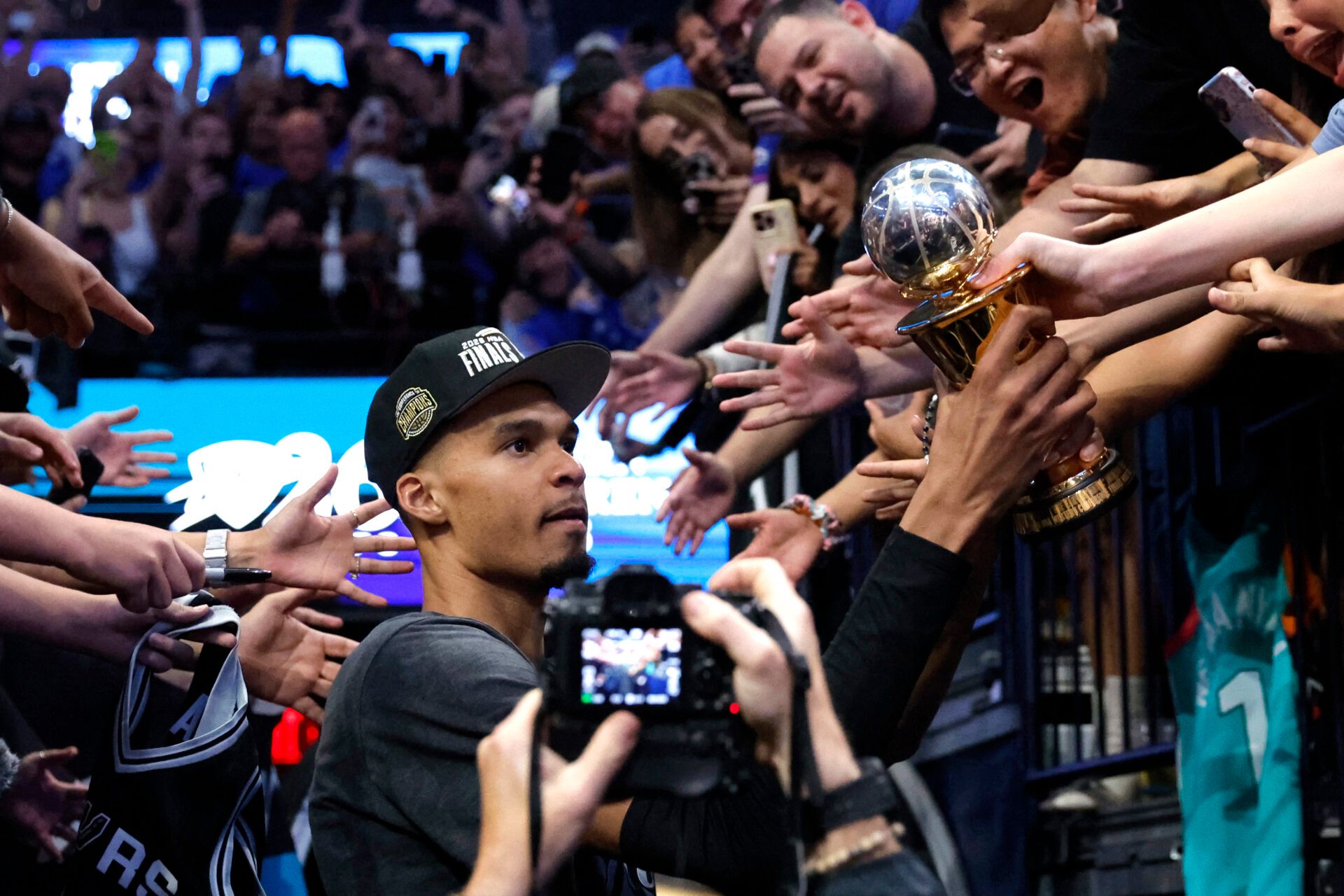 San Antonio Spurs forward Victor Wembanyama (1) celebrates with the MVP trophy after defeating the Oklahoma City Thunder in game seven of the western conference finals for the 2026 NBA playoffs at Paycom Center.