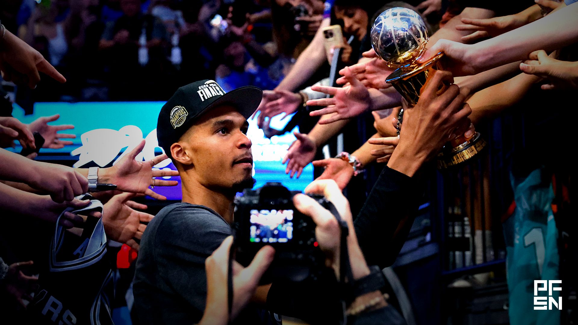 San Antonio Spurs forward Victor Wembanyama (1) celebrates with the MVP trophy after defeating the Oklahoma City Thunder in game seven of the western conference finals for the 2026 NBA playoffs at Paycom Center.