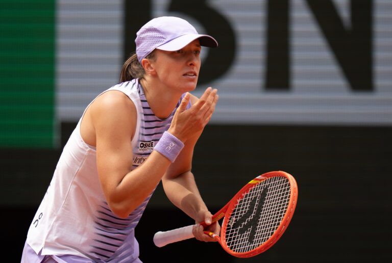 Iga Swiatek of Poland reacts during her match against Marta Kostyuk of Ukraine on day eight at Stade Roland Garros.