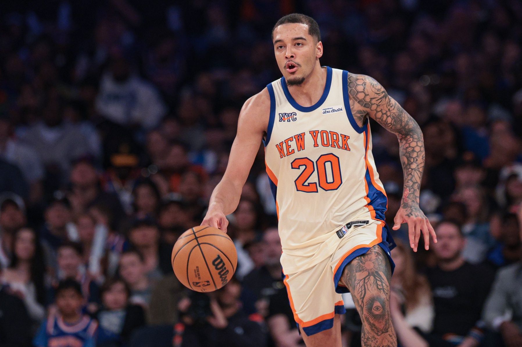 New York Knicks forward Jeremy Sochan (20) dribbles up court against the Charlotte Hornets during the second half at Madison Square Garden.