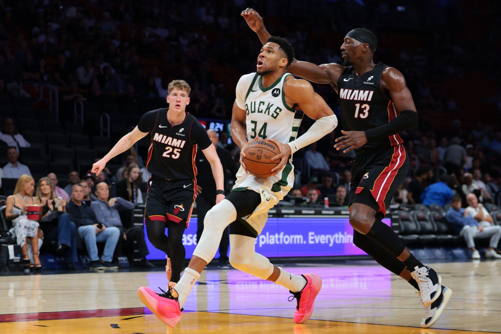 Milwaukee Bucks forward Giannis Antetokounmpo (34) drives to the basket against Miami Heat center Bam Adebayo (13) during the first quarter at Kaseya Center.