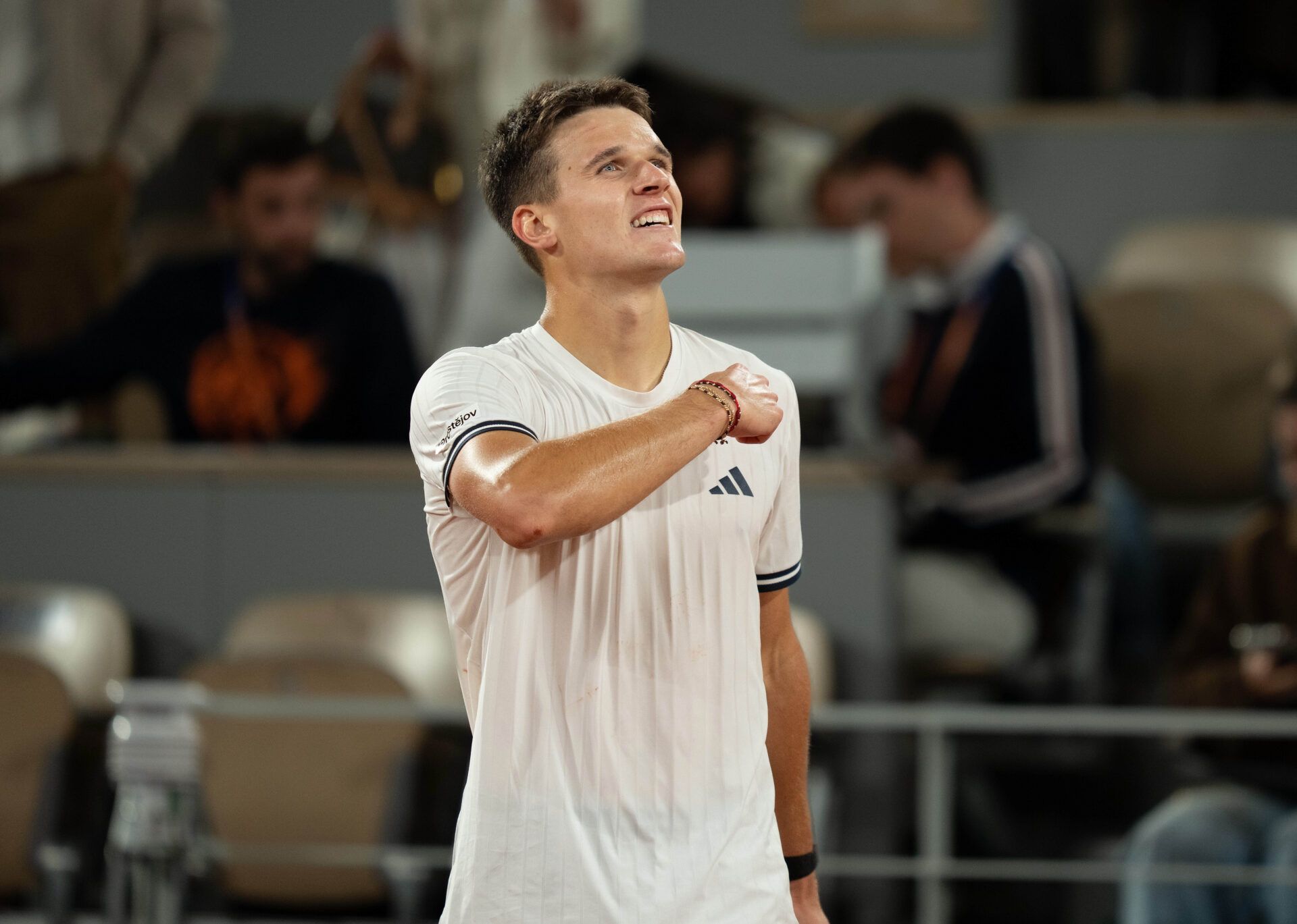 Jakub Mensik of Czechia celebrates winning his match against Joao Fonseca of Brazil on day 10 at Stade Roland Garros.