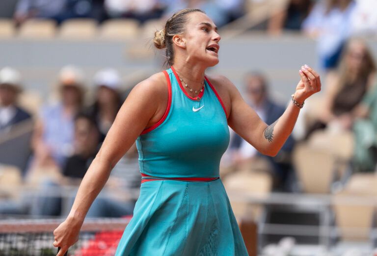Aryna Sabalenka reacts to a point during her match against Qinwen Zheng  of China on day 10 at Roland Garros Stadium.