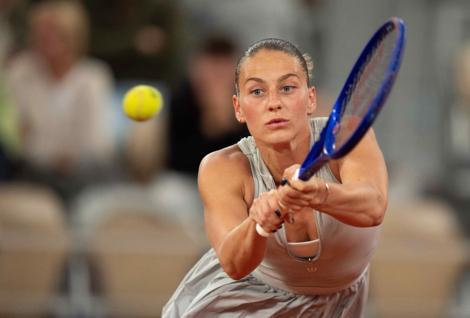 Marta Kostyuk of Ukraine returns a shot during her match against Elina Svitolina of Ukraine on day 10 at Stade Roland Garros.