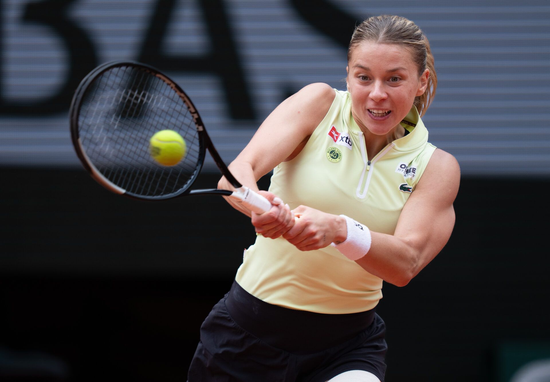 Maja Chwalinska of Poland returns a shot during her match against Anna Kalinskaya on day 10 at Stade Roland Garros.