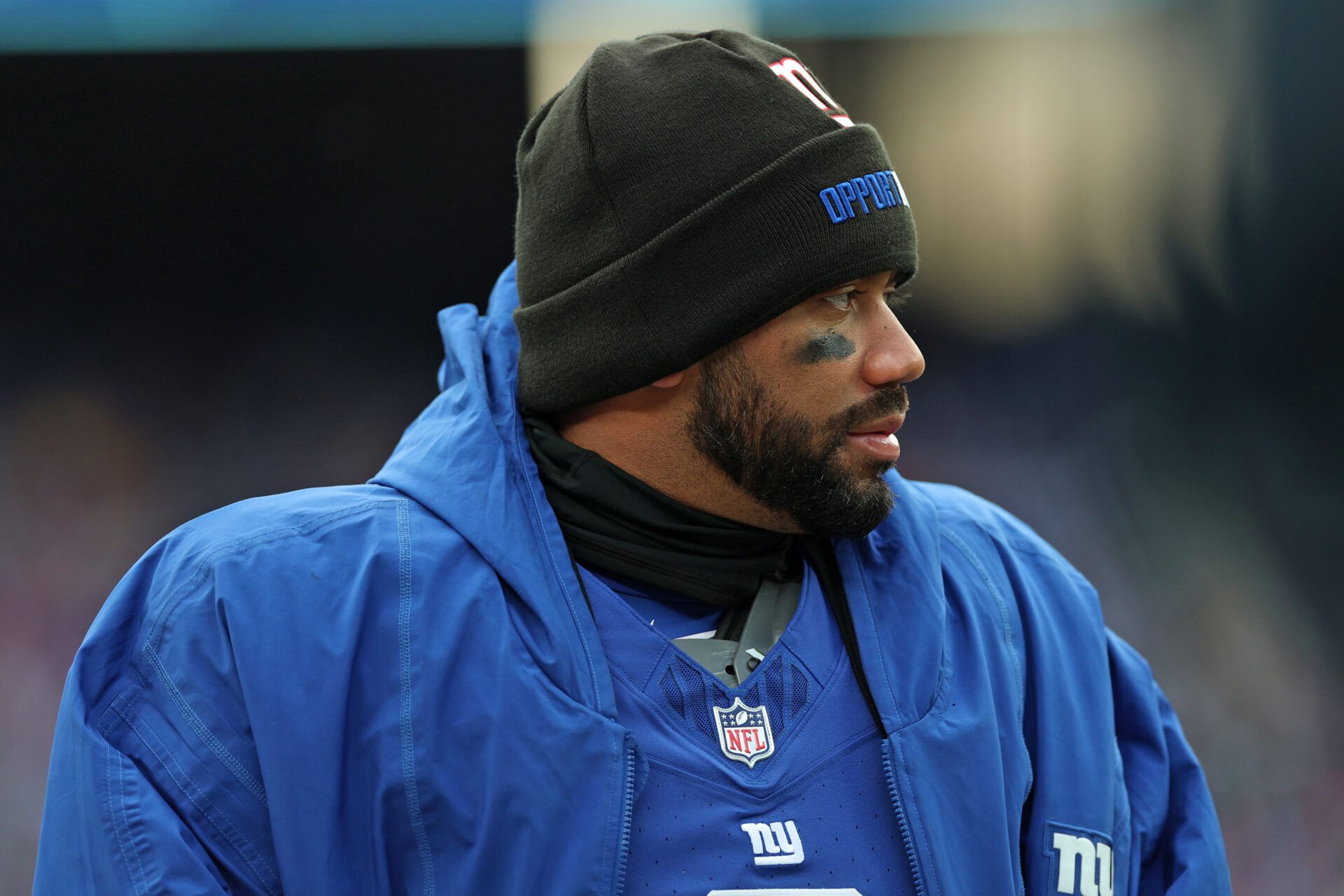 New York Giants quarterback Russell Wilson (3) stands on the sidelines against the Minnesota Vikings during the first half at MetLife Stadium.