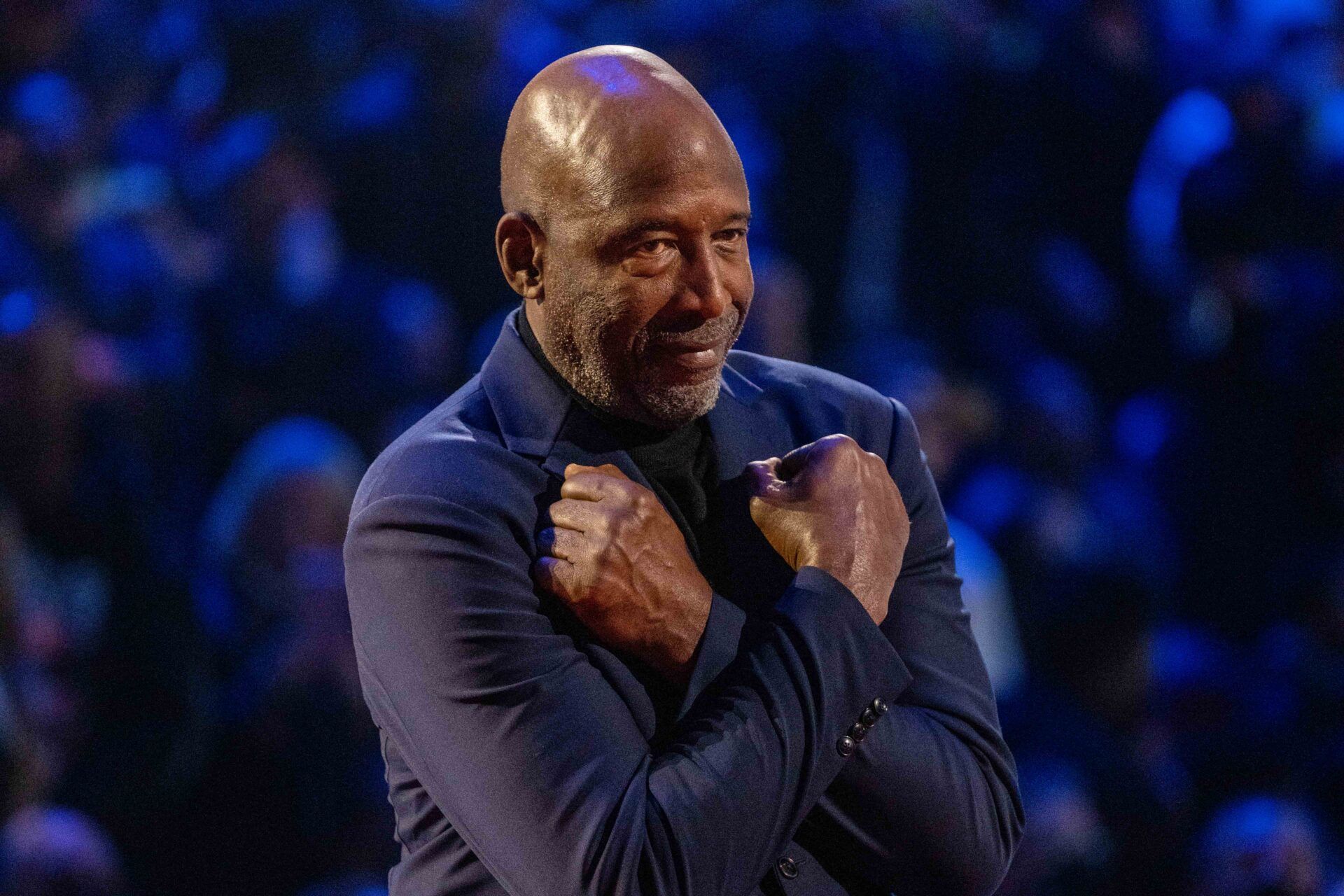 NBA great James Worthy is honored for being selected to the NBA 75th Anniversary Team during halftime in the 2022 NBA All-Star Game at Rocket Mortgage FieldHouse.