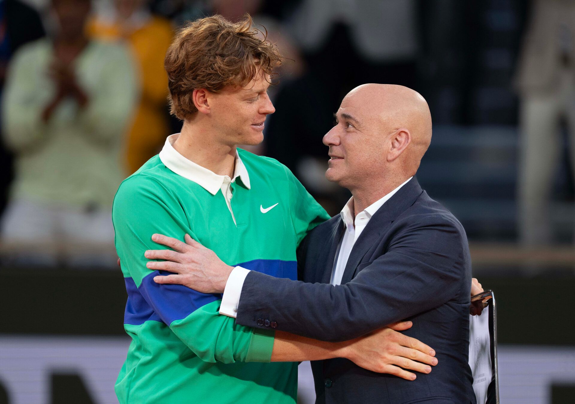 Andre Agassi and Jannik Sinner of Italy at the trophy presentation after Sinner lost the men’s singles final against Carlos Alcaraz of Spain on day 15 at Roland Garros Stadium.