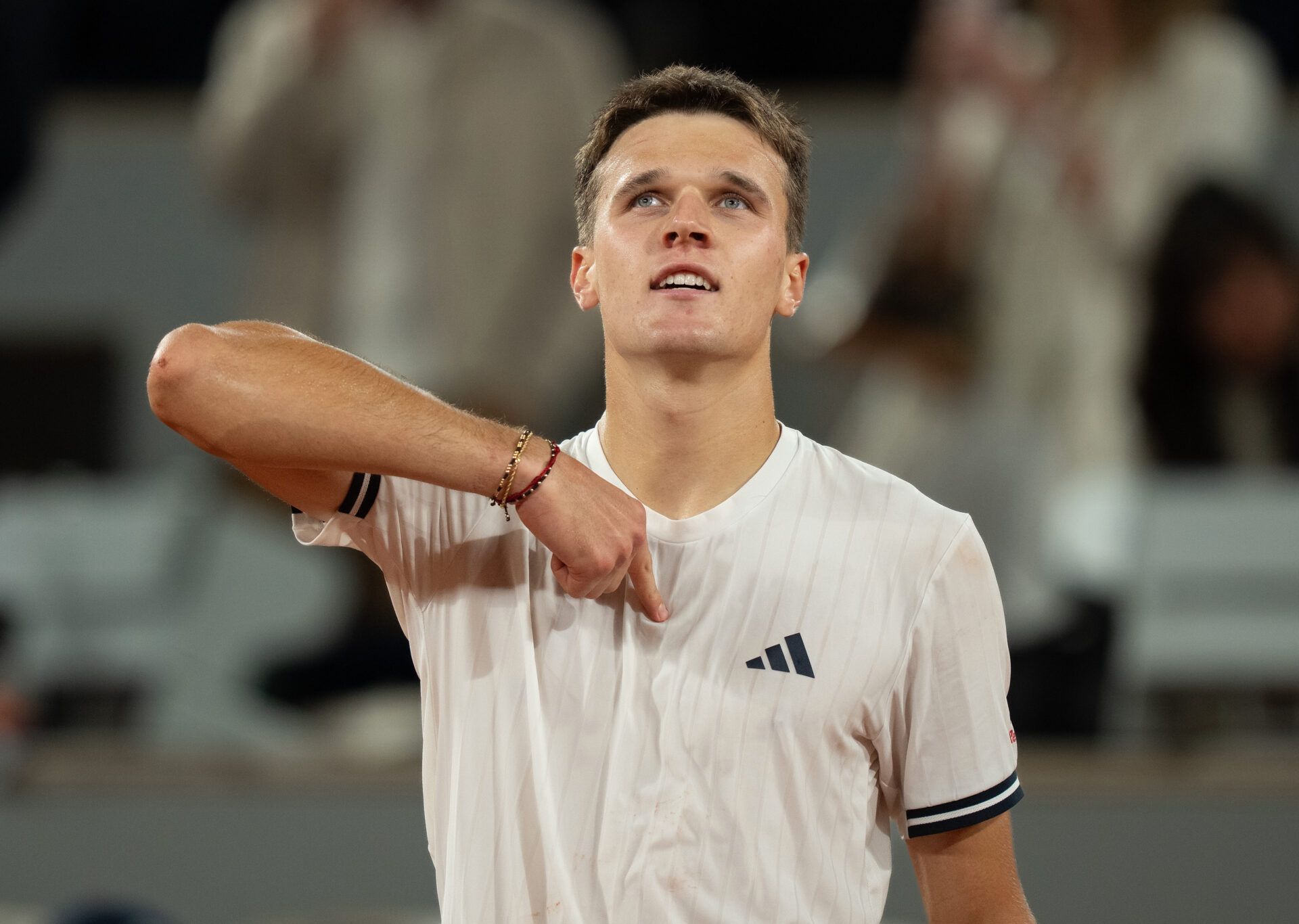 Jakub Mensik of Czechia celebrates winning his match against Joao Fonseca of Brazil on day 10 at Stade Roland Garros.