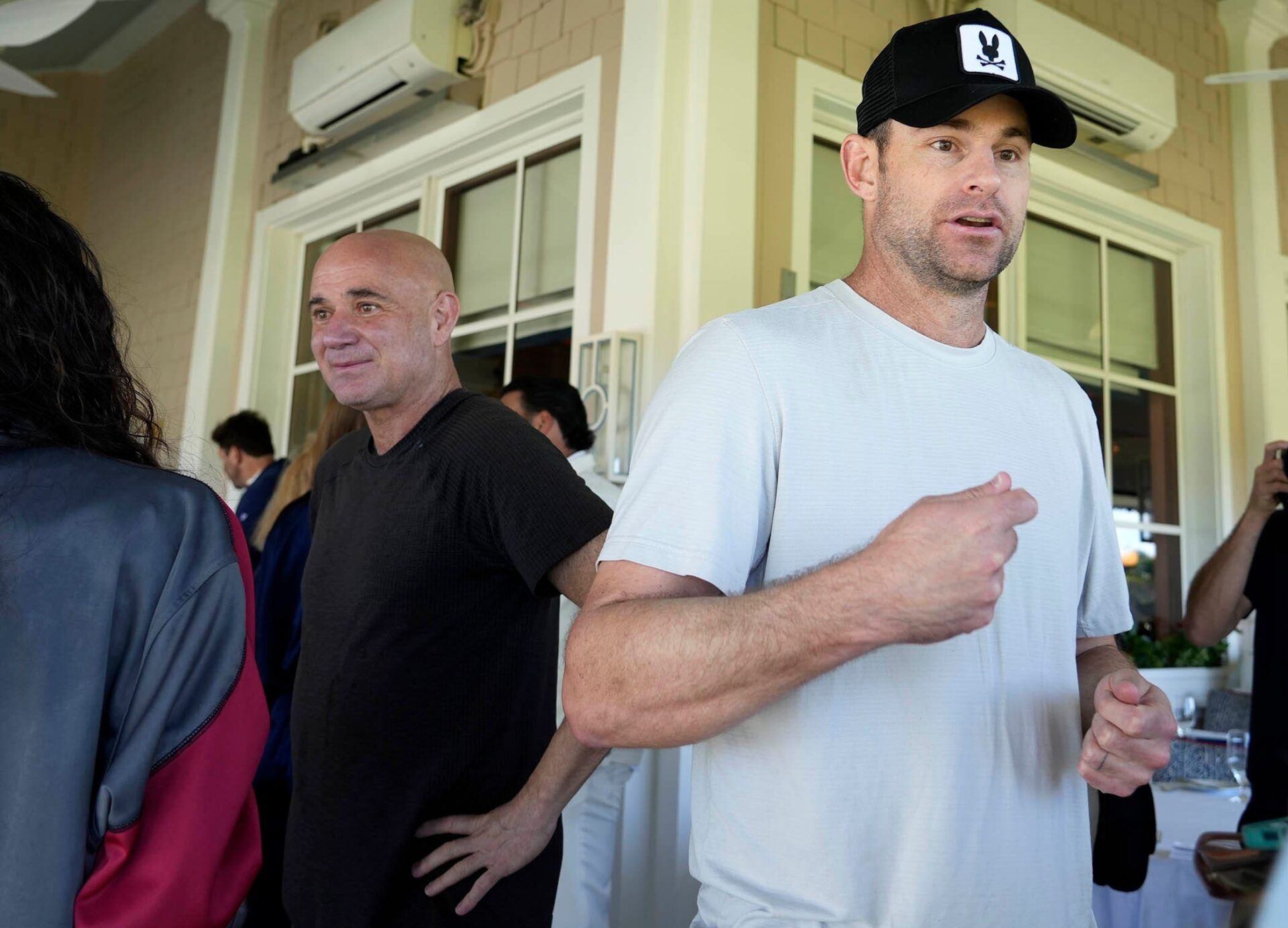 Andre Agassi and Andy Roddick speak to members of the press after the Mixed-Doubles Exhibition Match at the Breakers Friday March 21, 2025 in Palm Beach. The event celebrates the debut of the new tennis and racquet facilities benefits First Serve USA.