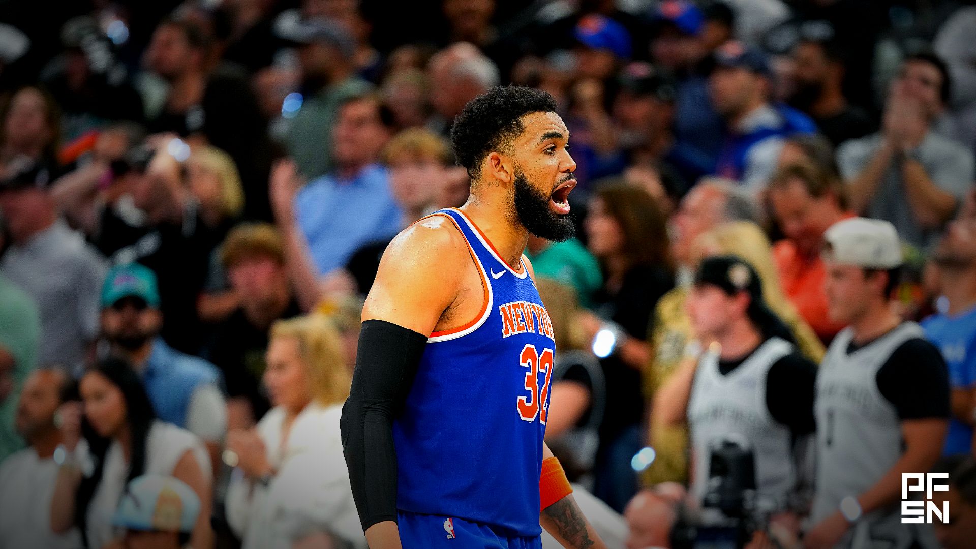 New York Knicks center Karl-Anthony Towns (32) celebrates in the second half during game two of the 2026 NBA Finals at Frost Bank Center.
