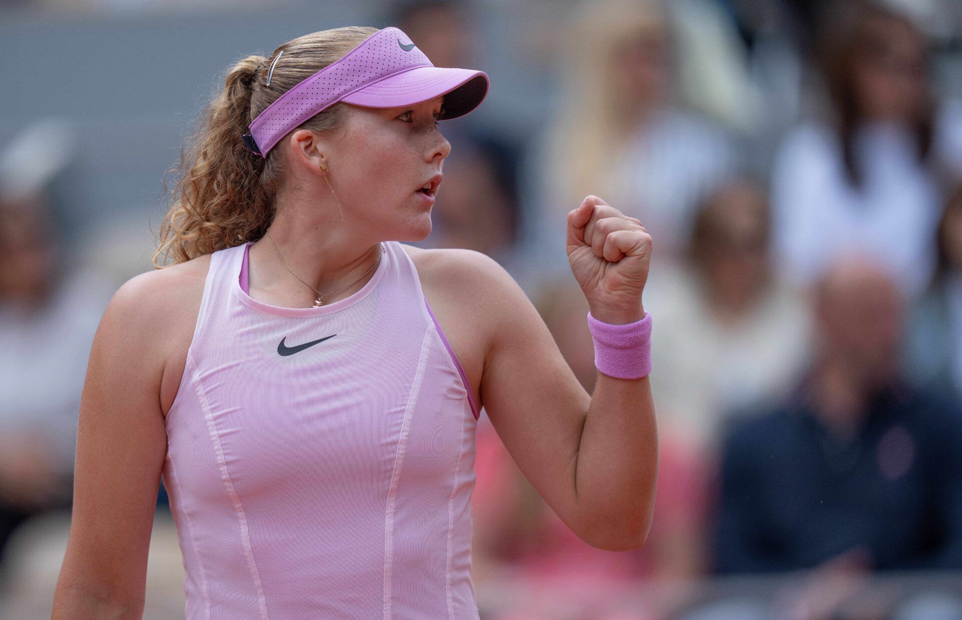 Mirra Andreeva reacts during her match against Marta Kostyuk of Ukraine on day 12 at Stade Roland Garros.