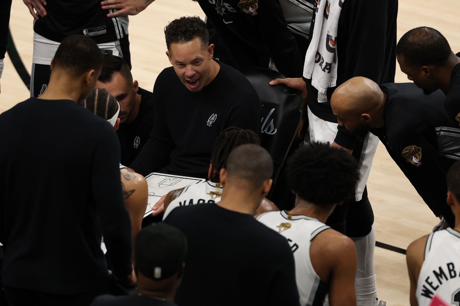 San Antonio Spurs head coach Mitch Johnson reacts in the second half during game two of the 2026 NBA Finals at Frost Bank Center.