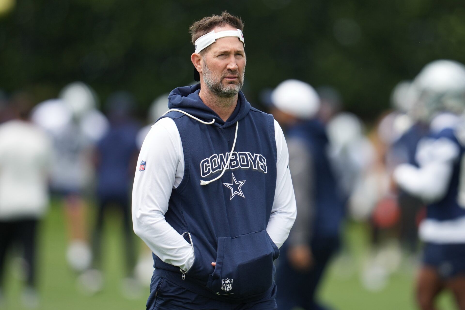 Dallas Cowboys head coach Brian Schottenheimer on the field during practice at the Ford Center at the Star Training Facility in Frisco, Texas.