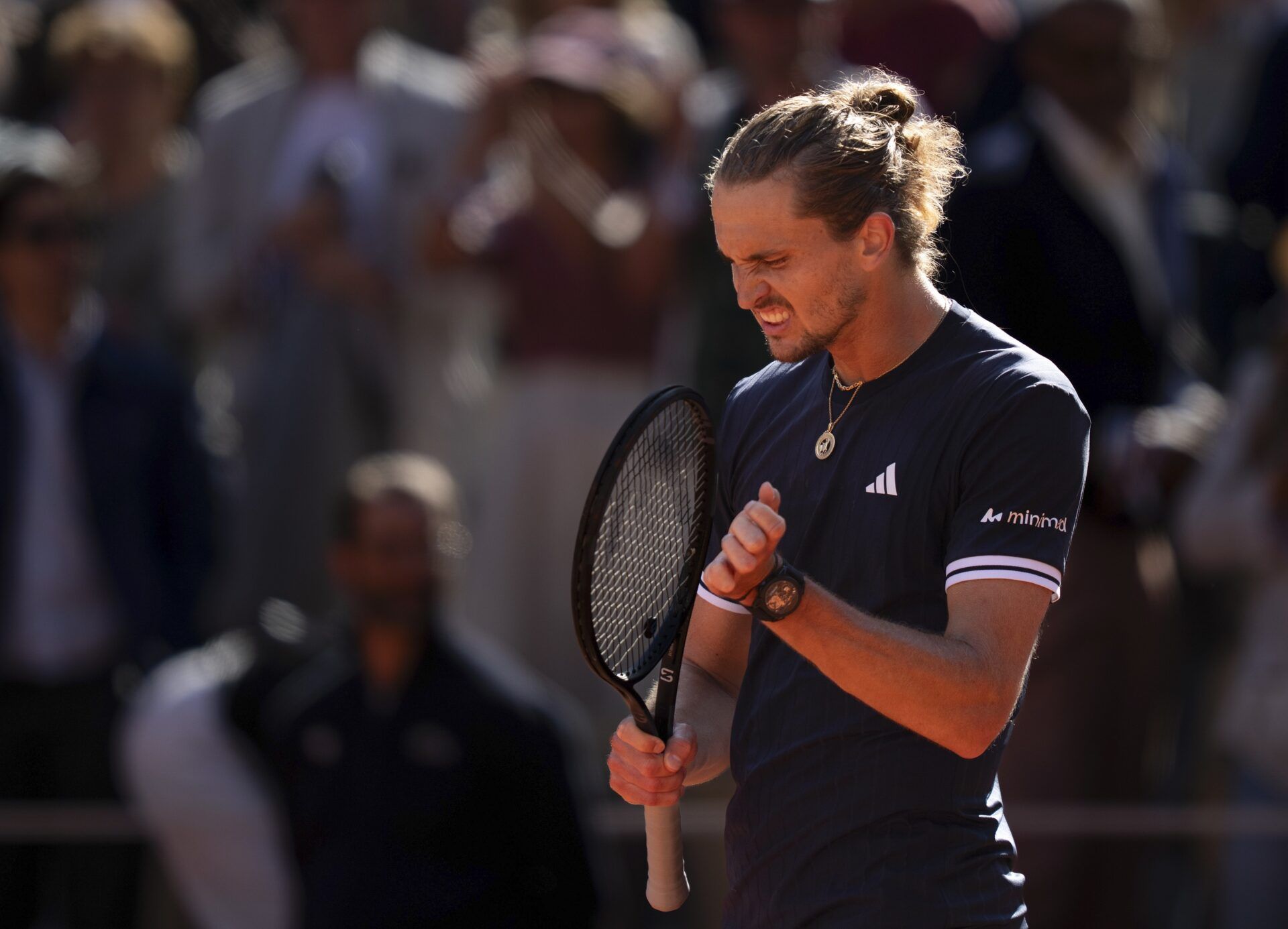Alexander Zverev of Germany celebrates winning his match against Jakub Mensik of Czechia on day 12 at Stade Roland Garros.