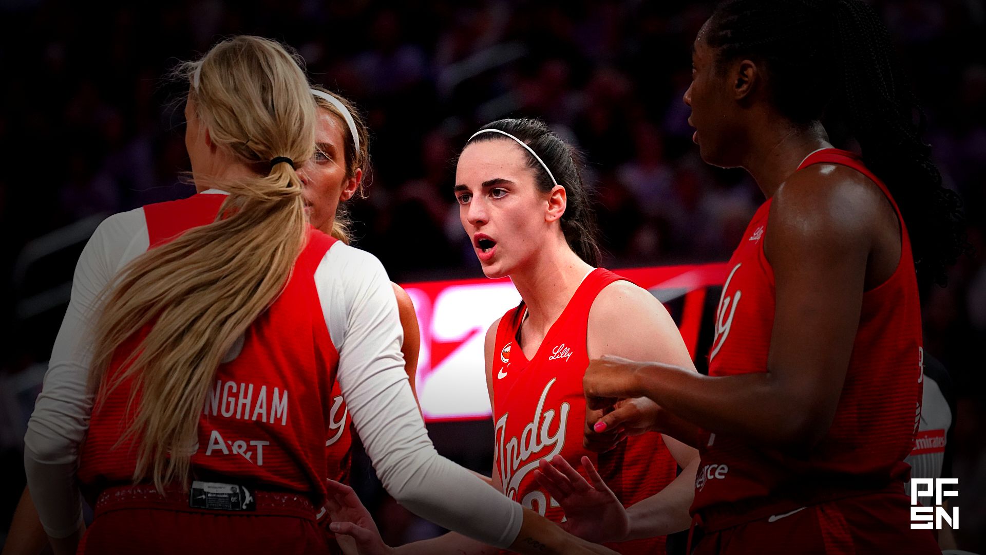 Indiana Fever guard Caitlin Clark (22) talks with guard Sophie Cunningham (8), guard Lexie Hull (10), and Indiana Fever during a game against the Golden State Valkyries in the fourth quarter at Chase Center.