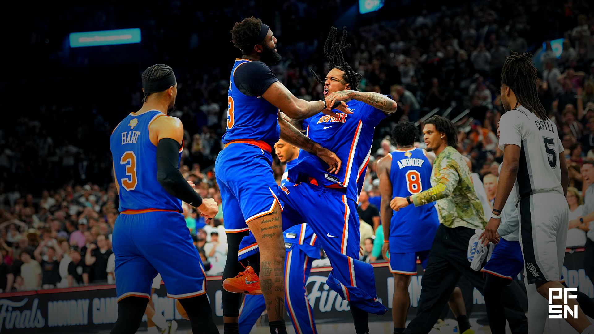 The New York Knicks celebrate after they defeat the San Antonio Spurs in game two of the 2026 NBA Finals at Frost Bank Center.