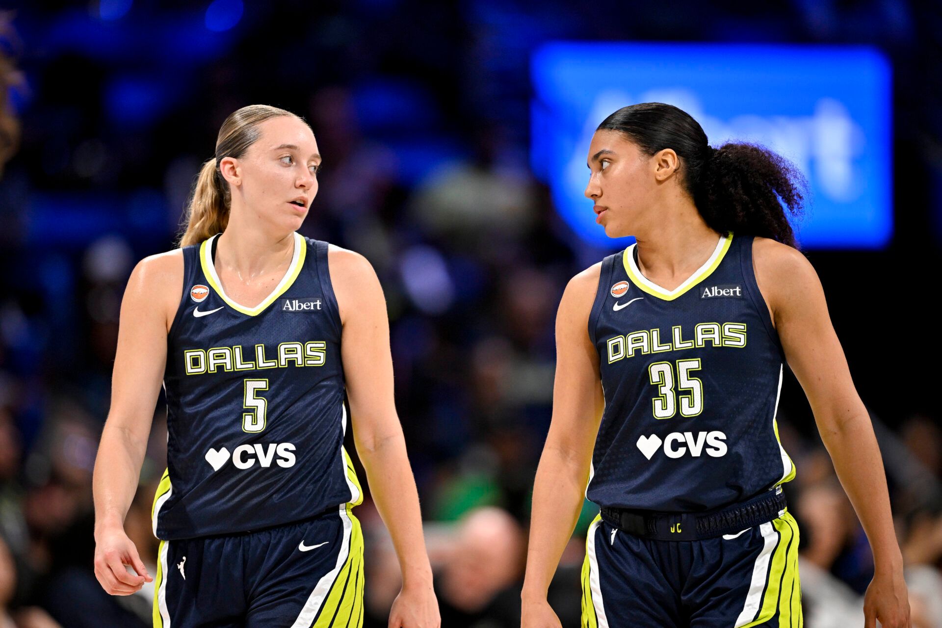 Dallas Wings guard Paige Bueckers (5) and guard Azzi Fudd (35) walk back on to the court during the first half against the Seattle Storm at College Park Center.